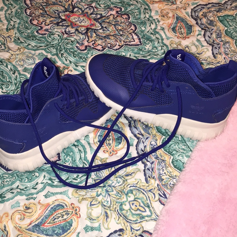 Blue adidas tennis shoes